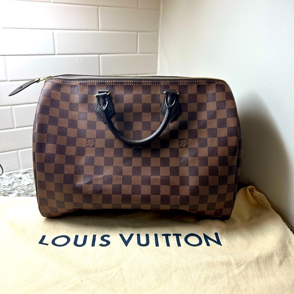 Pristine Louis Vuitton 35 Demi Speedy never used